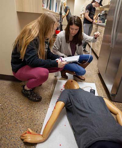 Students at a crime scene